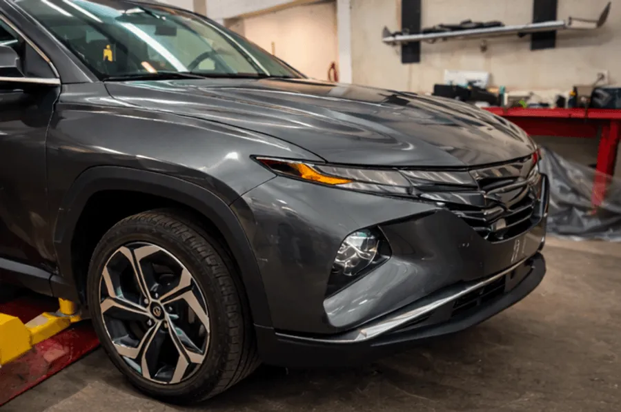 The same SUV finished after front-end repair and paint at Scenic 61 Auto Body
